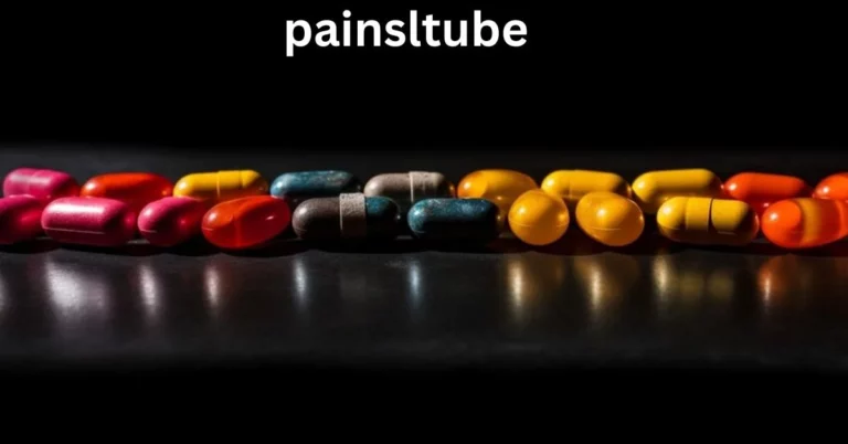 a row of pills on a black surface